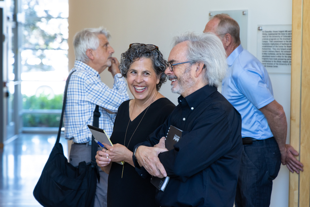 Twopeoplelaughinginalobby