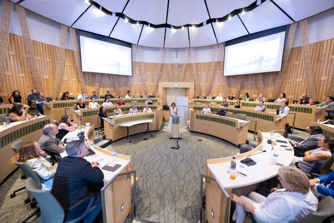 Peoplegatheredinacircularauditorium