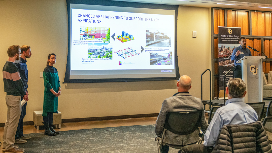 Students presenting a project at the Urban Design Spotlight event at the Jake Jabs Center.
