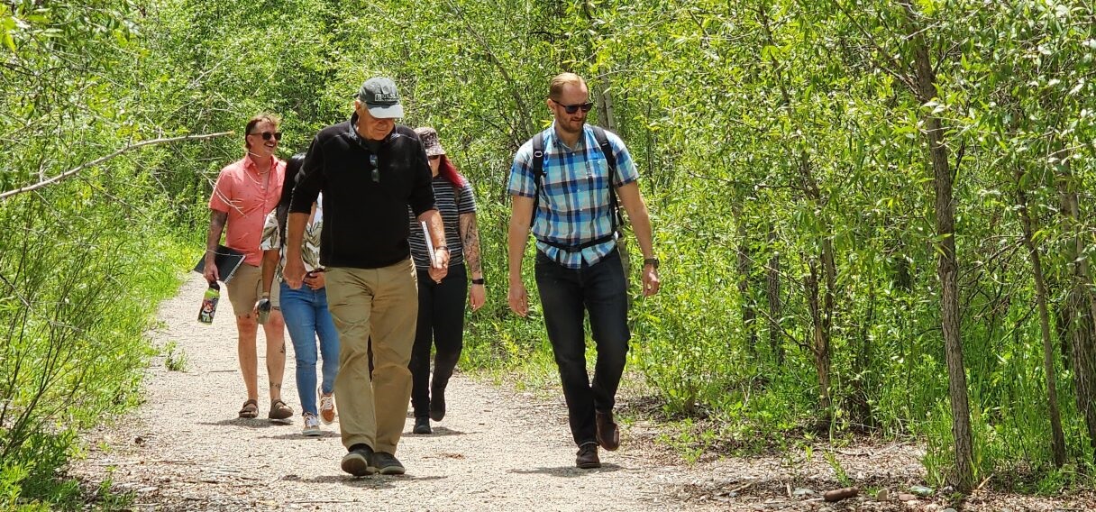 Harry Teague takes students on a site walk in the Roaring Fork Valley area near the 2023 project site.
