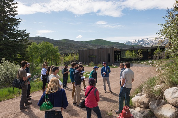 Large group of students visiting at site in Aspen