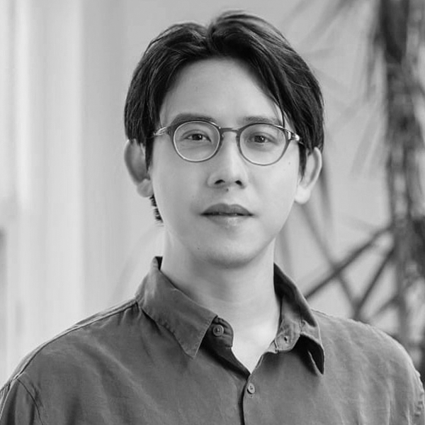 Ethan Chiang's headshot in black and white.