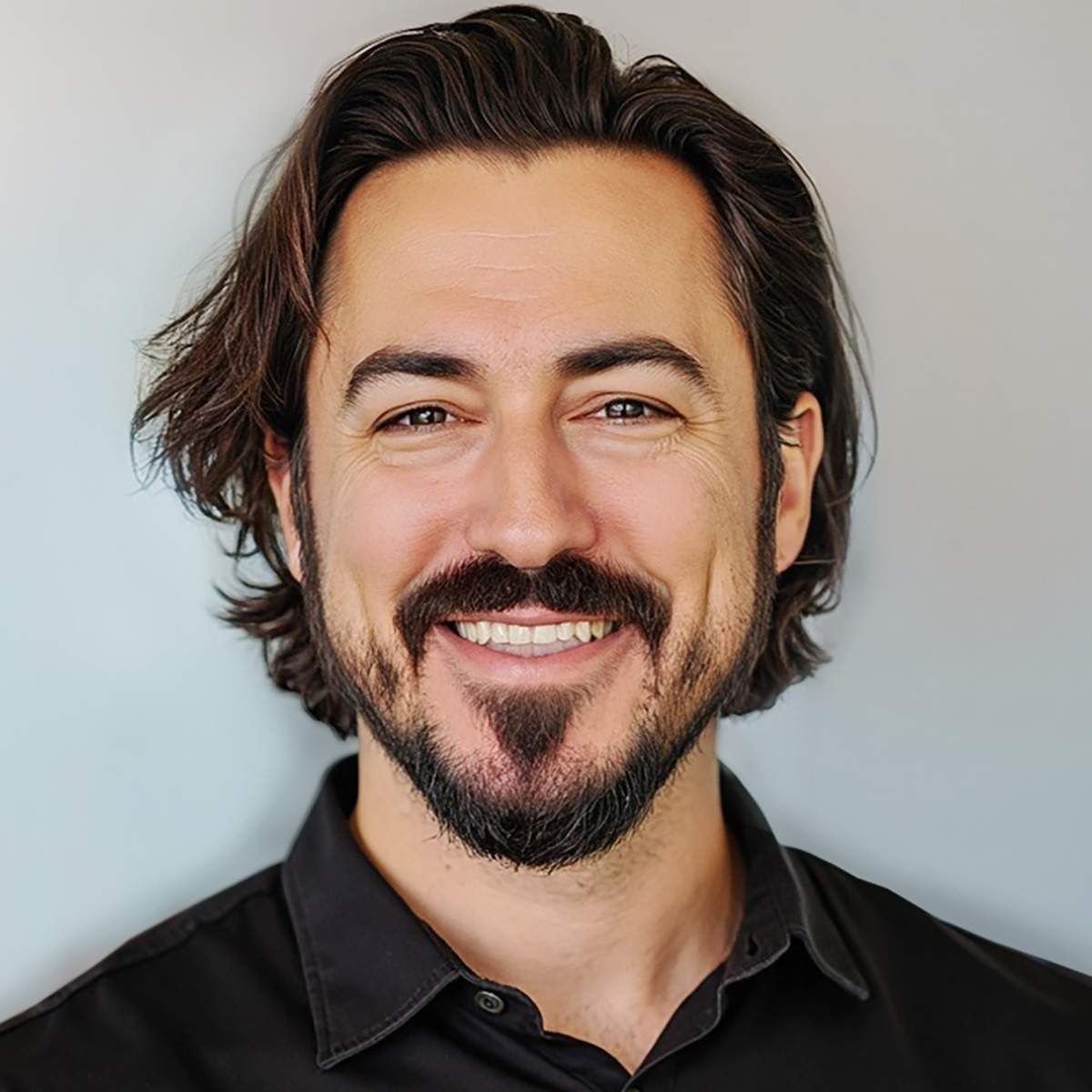 Mark Delatorre's headshot.