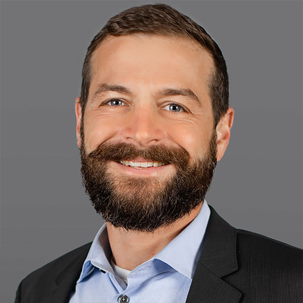 Travis Bogan's headshot.